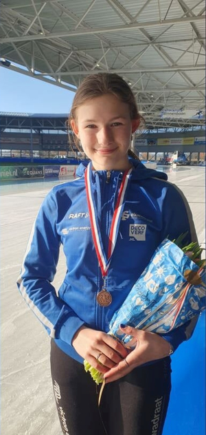 Eva-Sofie met haar medaille